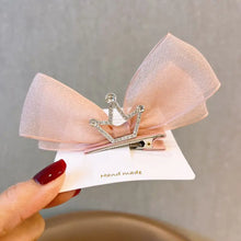 Load image into Gallery viewer, Princess hair clip with bow and crown detail.
